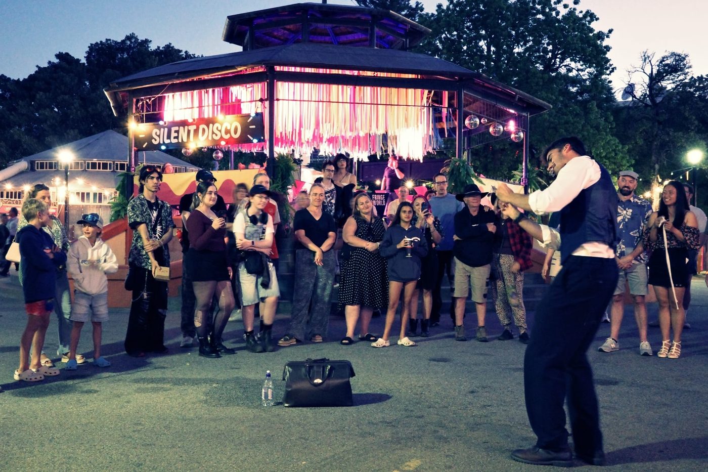 Dominic performing to a festival crowd at night