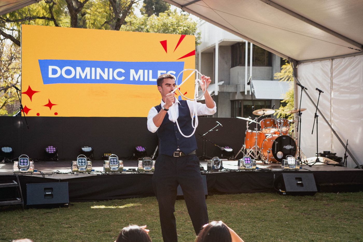 Dominic Miles performing a stage show
